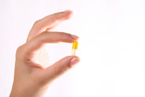 Pill in hand